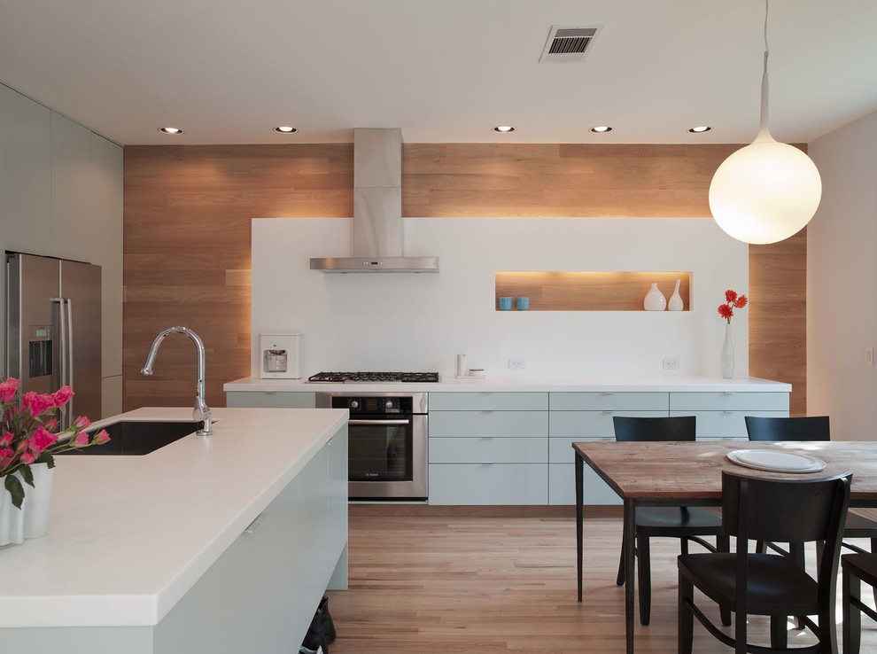 Stylish kitchen design with wood wall accents