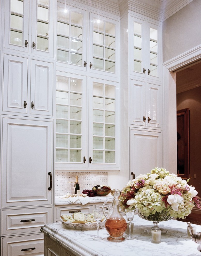 Traditional kitchen with antique glazed cabinets