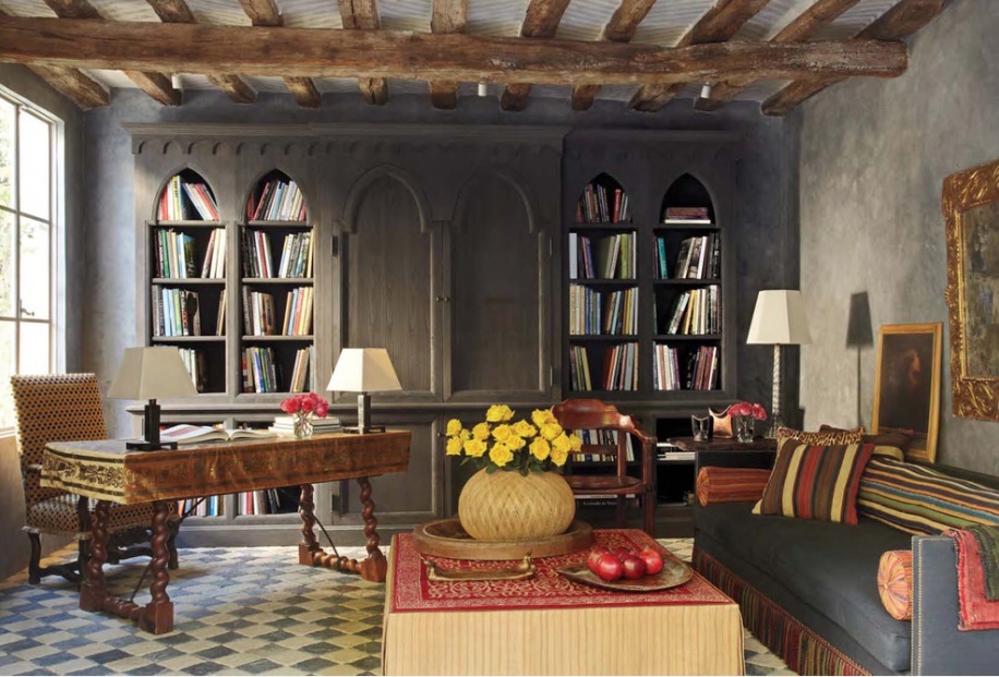 Victorian Gothic home library with arched bookshelves