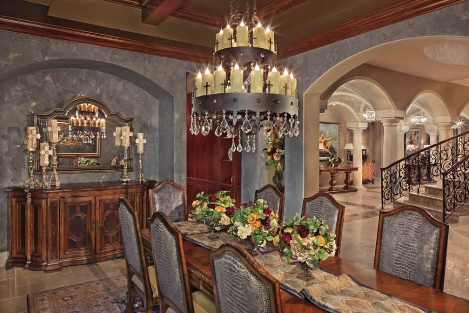 Victorian mansion dining room with candle chandelier