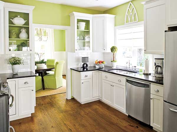 White and green kitchen with open plan interior