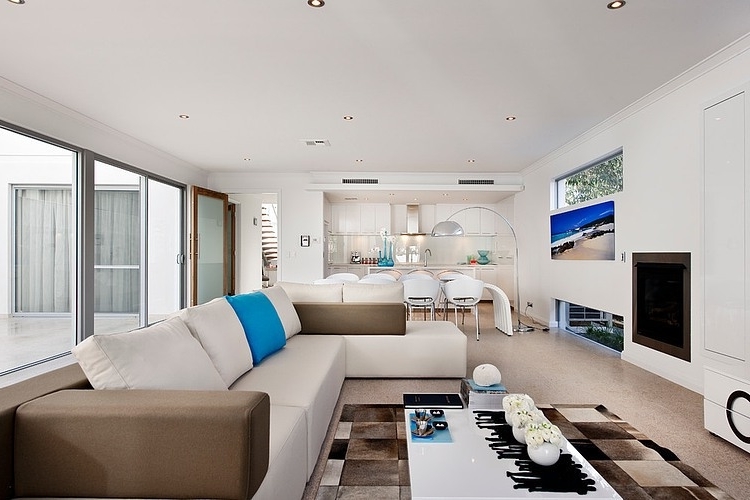 White living room with brown accents