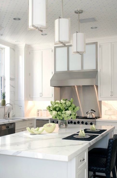 White marble countertops in a modern kitchen