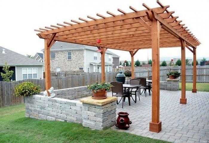 Wood pergola in the middle of the backayrd