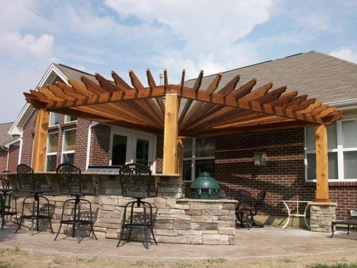 Wood pergola with barbecue area for garden family parties