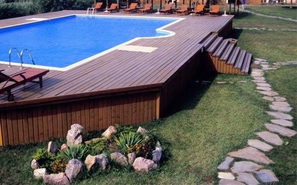 Wooden deck and outdoor swimming pool