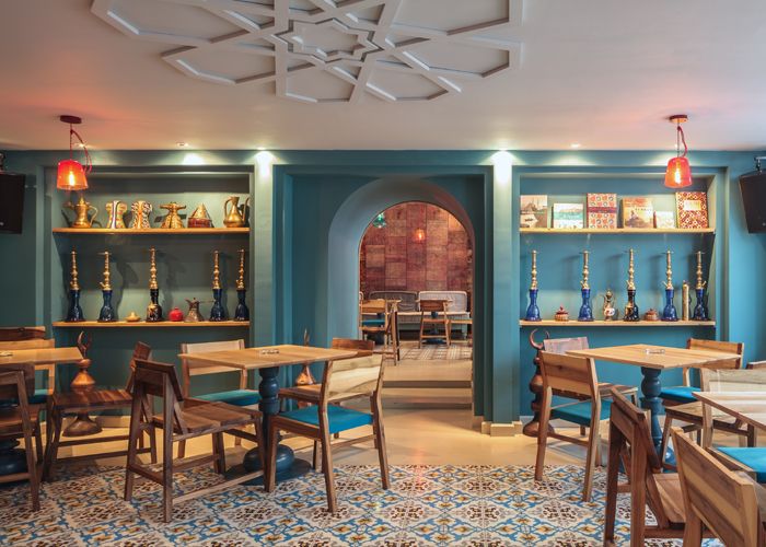 Cafe in Istanbul - with cyan walls and decorative rugs