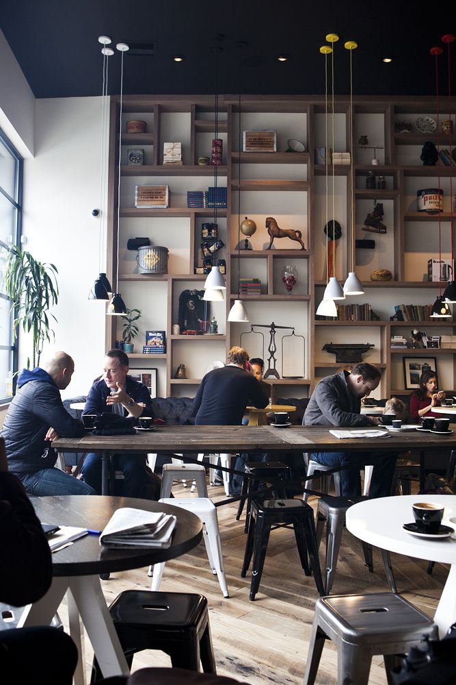 Cafe in Milan - with modern interior and wood shelves