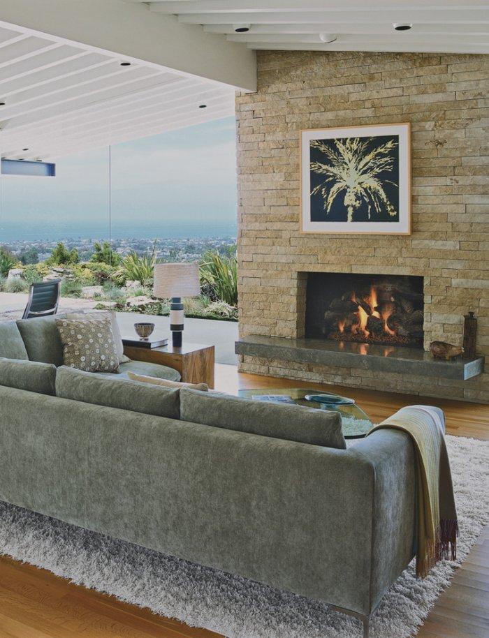 Mid-century modern living room - with grey sofas and a fireplace