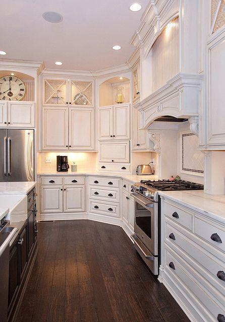 Modern traditional cabinets - in a white spacious kitchen