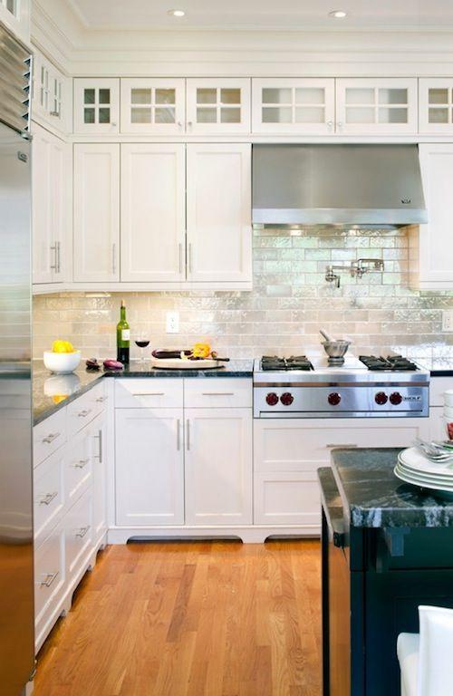 Modern white cabinets - in a moderate kitchen design