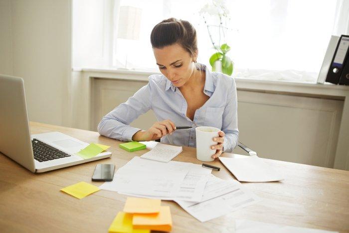 Beautiful Young Woman Working At Home