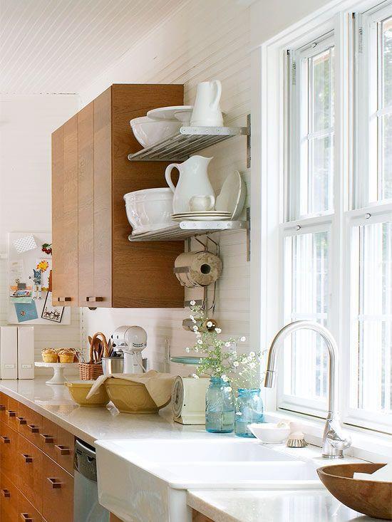 Simple white countertops - in a small flat kitchen