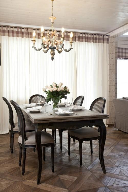 Summer villa - traditional dining room with solid table and chandelier above it