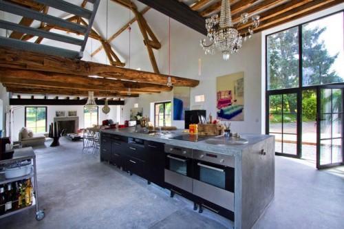 Summer villa with ultra modern open plan kitchen and rustic barn beams