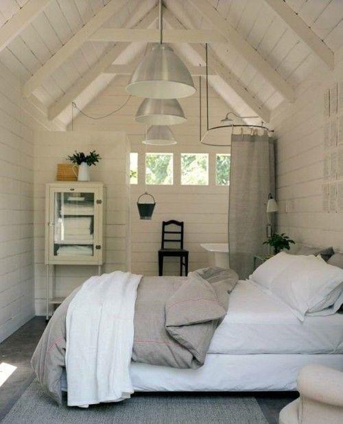 Swedish attic bedroom - with modern stylish pendants