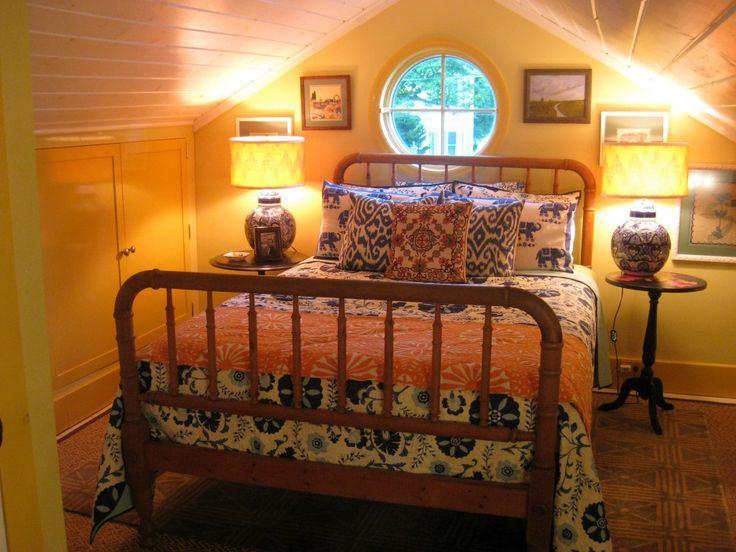 Traditional attic bedroom - with bedside lamps