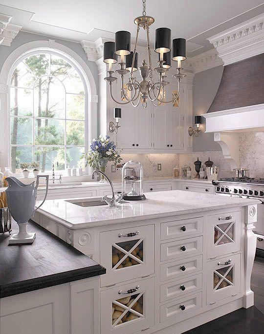 Traditional white countertops - in a fancy house kitchen