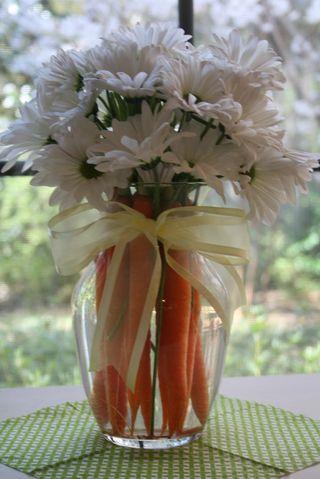 White flowers - in a pot with carrots inside