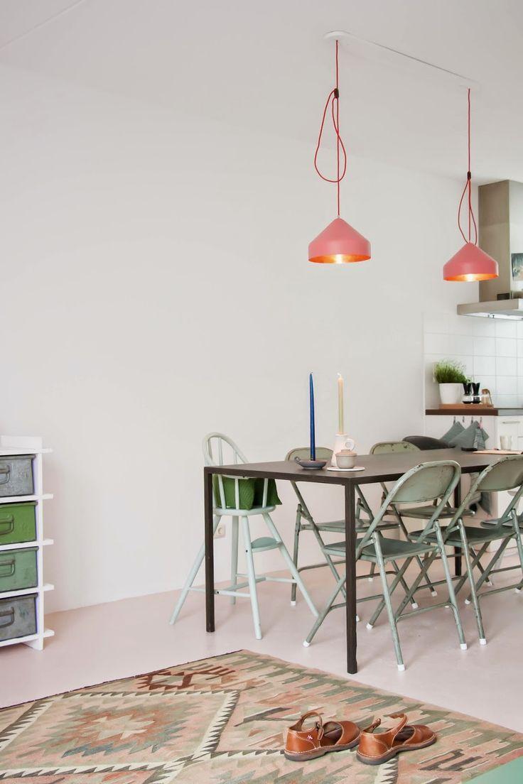 Apartment dining room - with pink pendants and graphic rug
