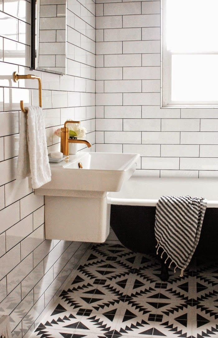 Black and white bathroom - with graphic mosaic floor