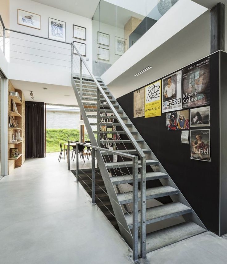 Contemporary staircase - with wall posters