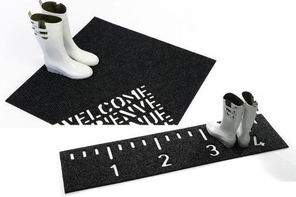 Creative black welcome mat - for placing in front of the entry door