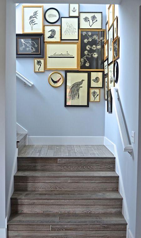 Creative modern staircase design - with various images on the wall