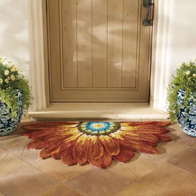 Creative outdoor rug - placed in front of the entry door