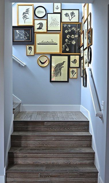 Creative staircase decor - with framed photos of various things