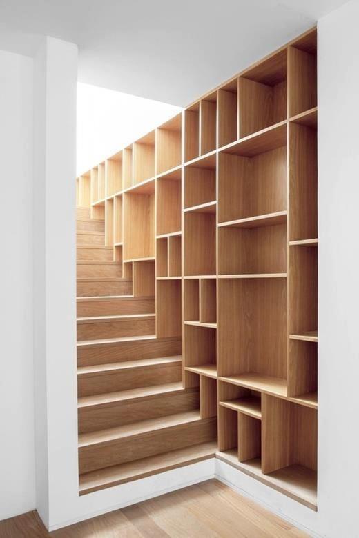 Creative wooden staircase - with shelves on the wall