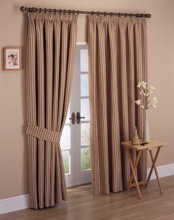 Elegant curtains - inside pale painted bedroom