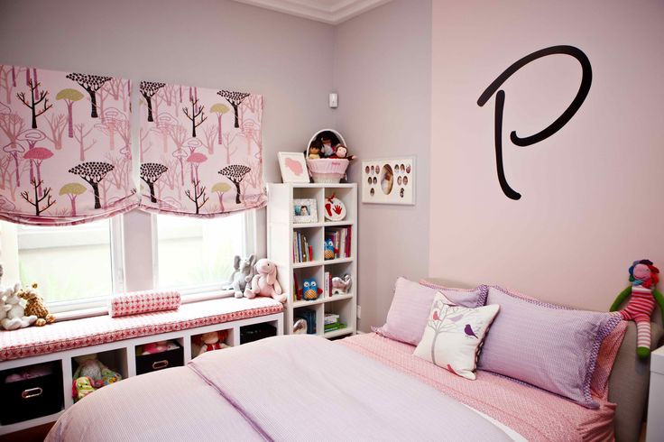 Feminine pink bedroom - with the letter P written above the bed