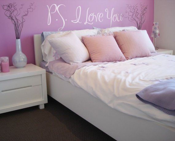 Girly pink bedroom - with love writing above the bed