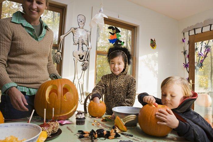 Halloween DIY crafts - a family working on them