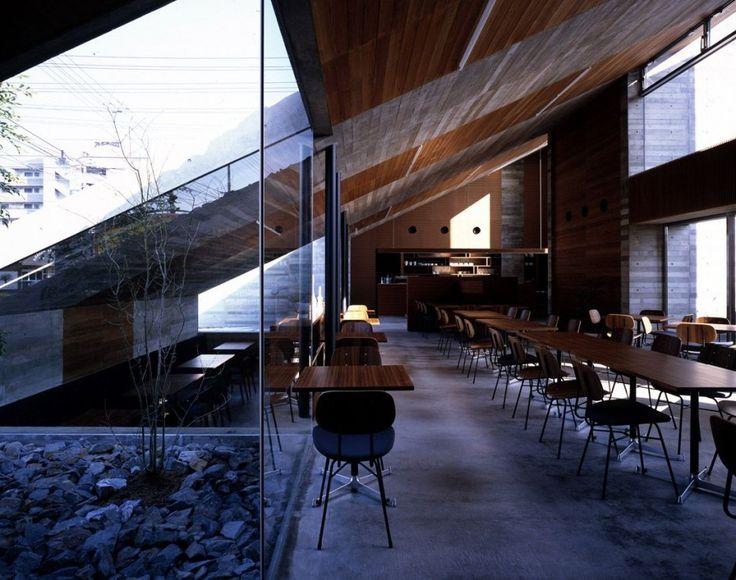 Minimalist cafe - with glass facade and tables