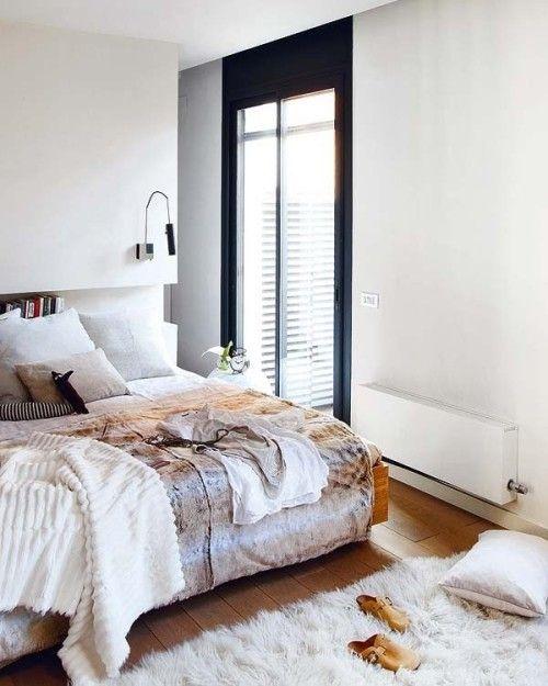 Modern apartment bedroom - with fluffy rug on the floor