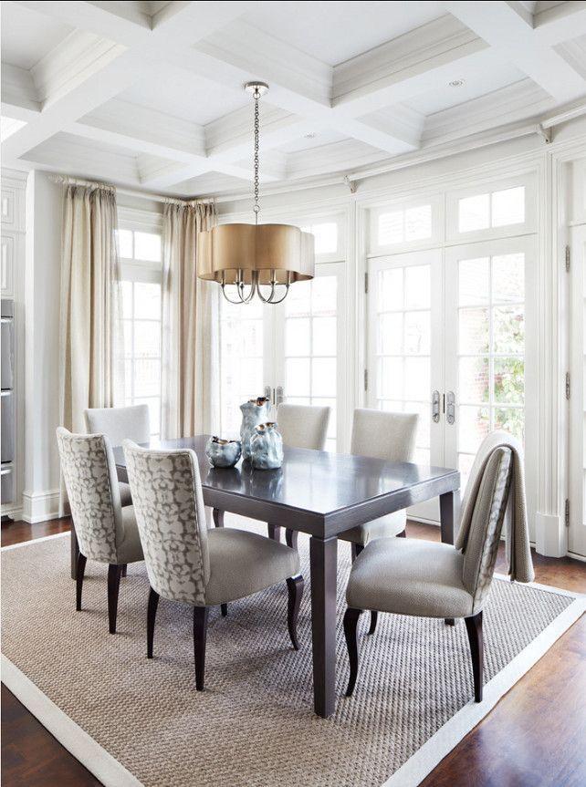 Modern house dining room - with grey chairs and rug