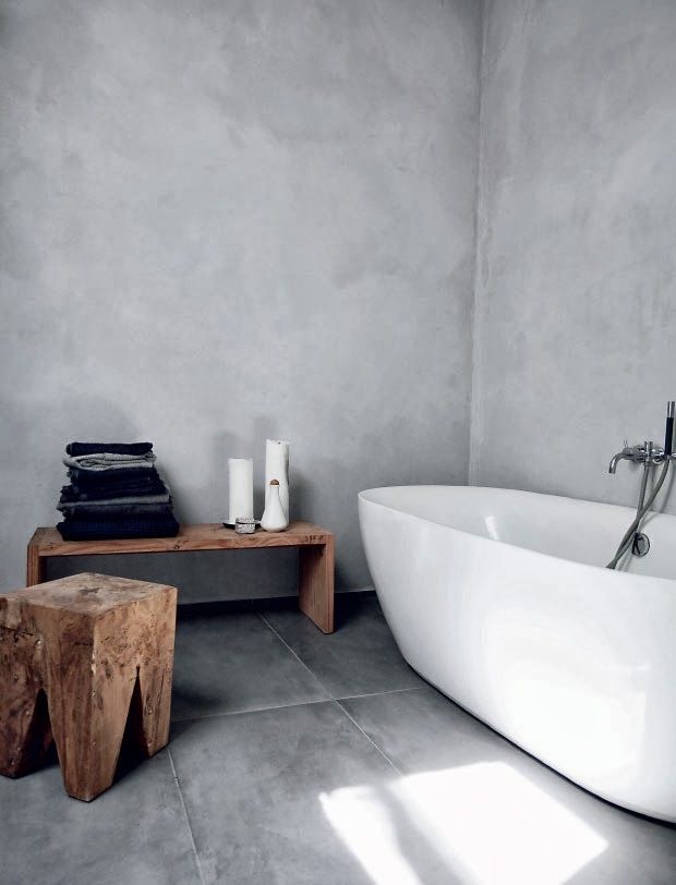 Modern industrial bathroom - with rustic accents and modern tub