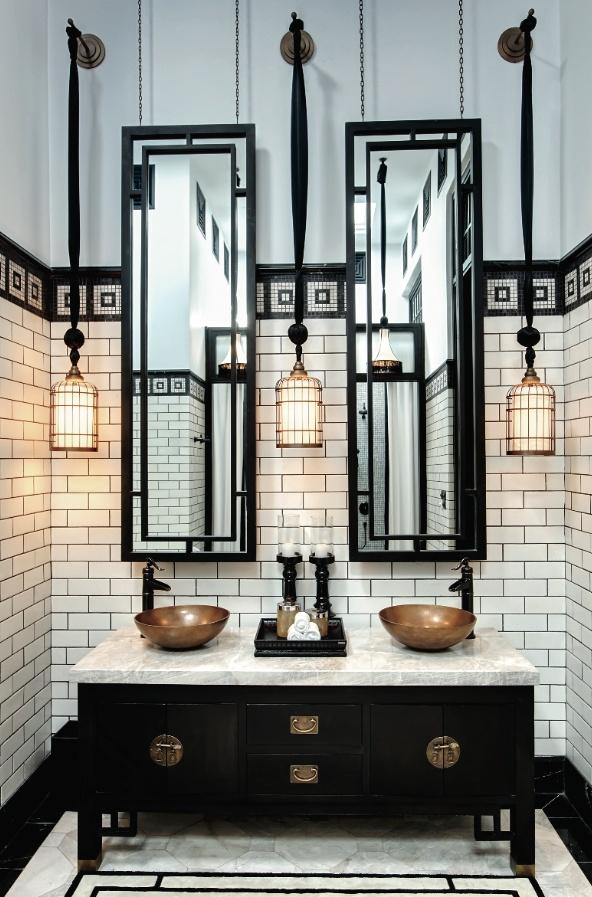 Modern traditional restroom - with round faucets and mirrors