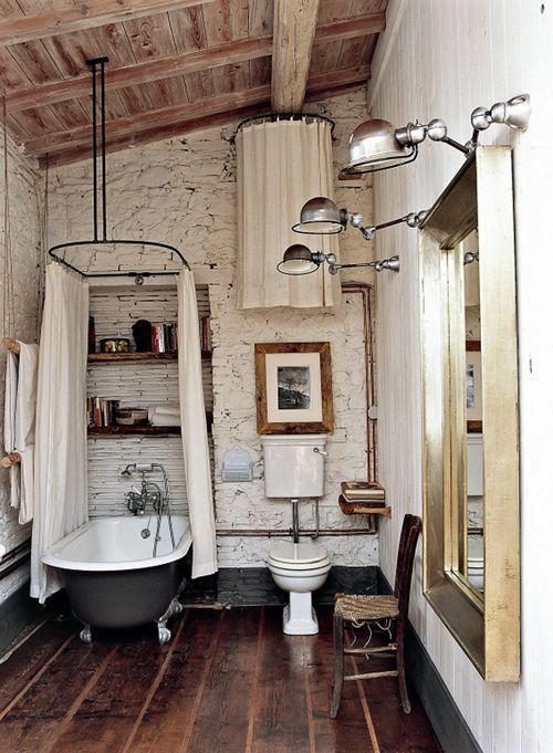 Modern vintage bathroom - with industrial light fixtures and bathtub