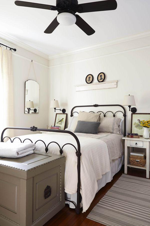 Modern vintage bedroom - with black framed bed