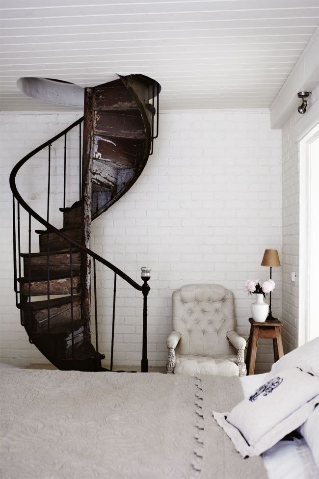 Rustic spiral staircase - painted in dark color