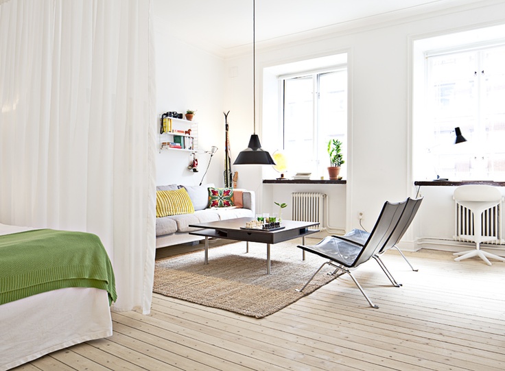 Scandinavian small apartment - with living room in white and black