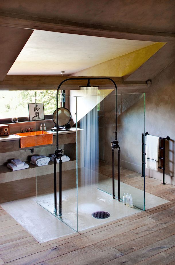 Small attic shower area - with walls made of glass