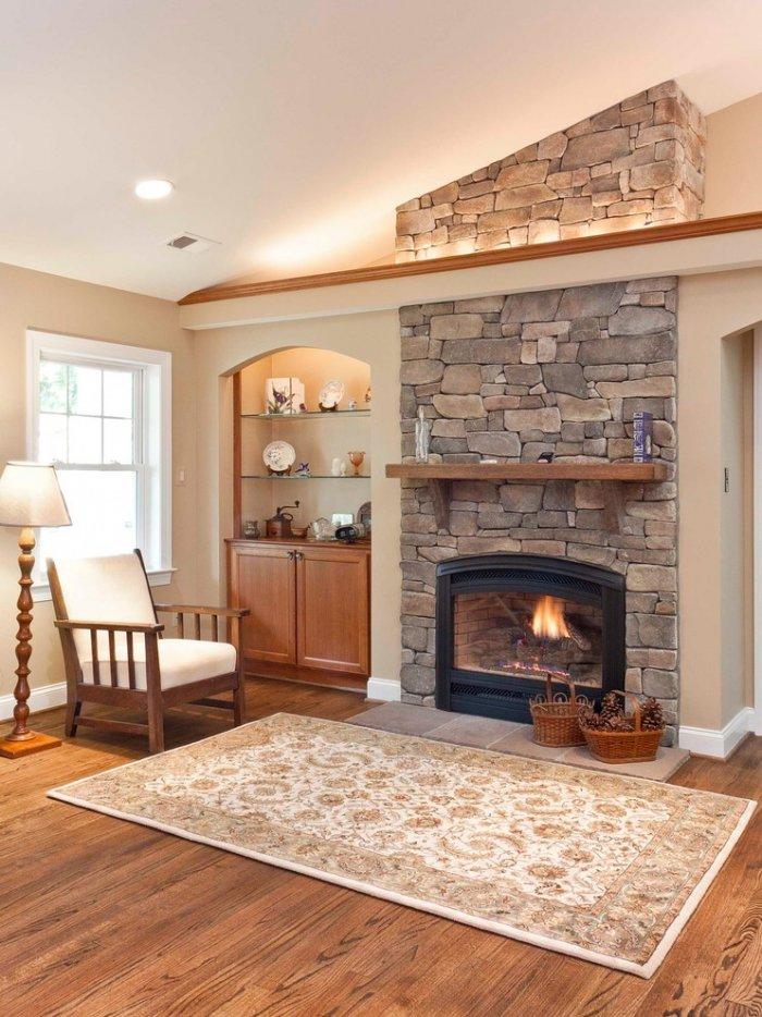 Small stone fireplace - inside a traditional home