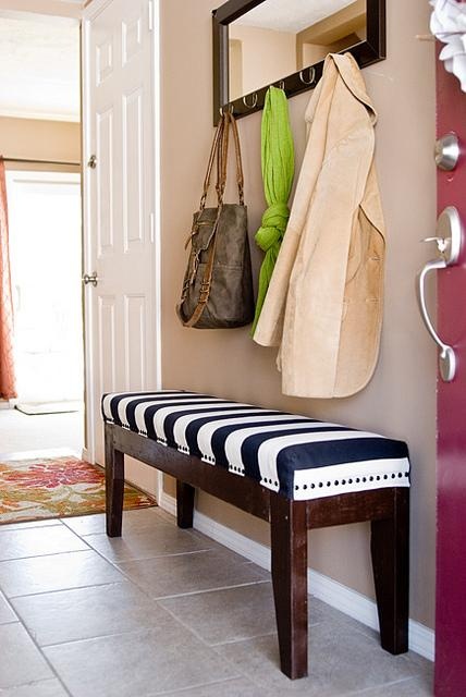 Striped entryway bench - and coat rack above it