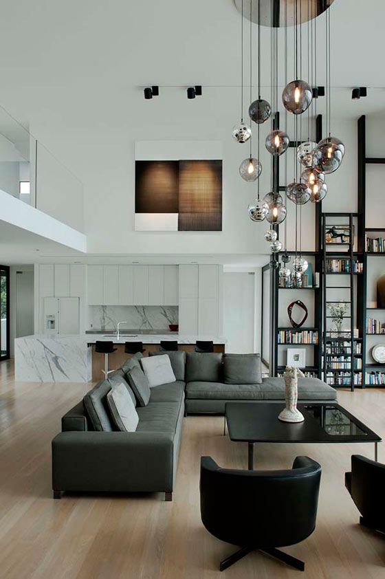 Stylish modern living room - with contemporary pendants and sofas