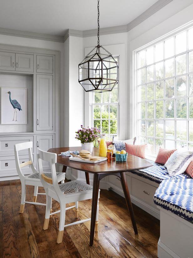 Sunny dining room - with small table, chairs and windowside sofa