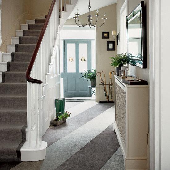 Traditional hallway furniture - and staircase leading to the second floor